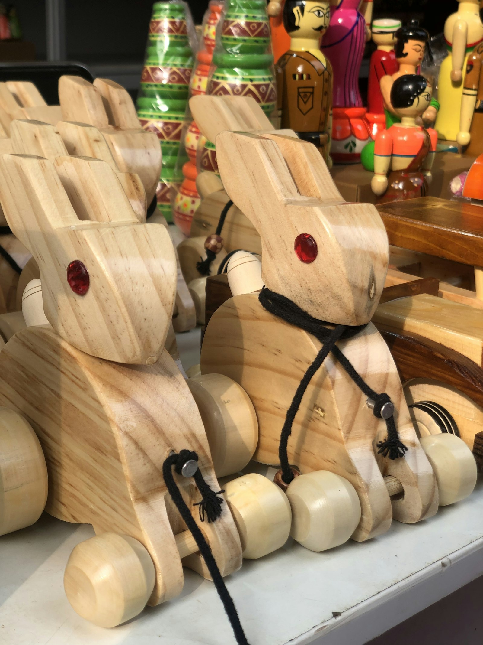 Carved wooden rabbits — natural material play